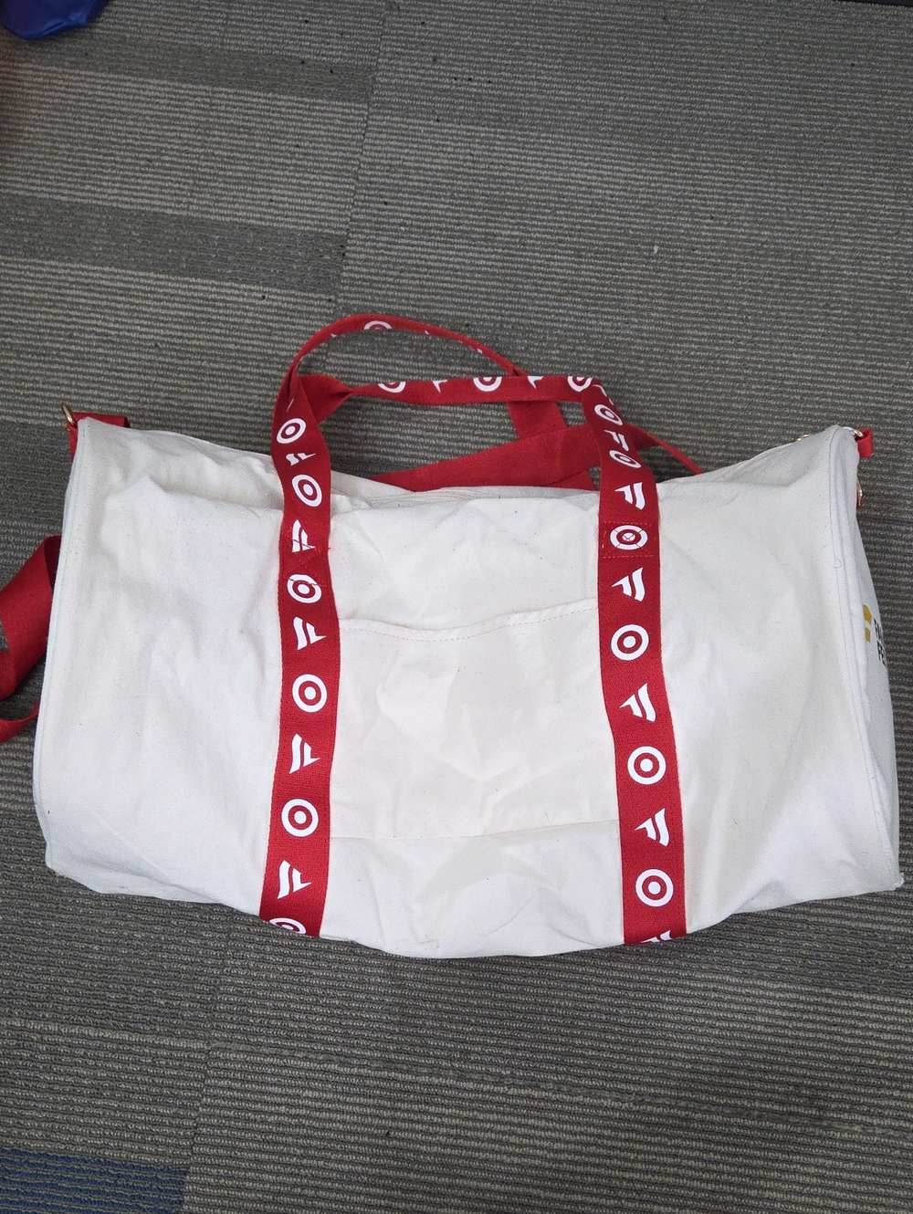 Target Fanatics Fest White Canvas Travel Duffel with Red Logo Straps